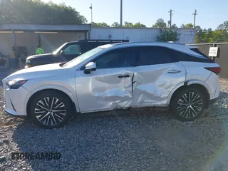 2023 Lexus RX 350 z VIN JTJCHMAA7P2002716, wystawiony jako IAAI lot #42043659 z przebiegiem 49 209 mil mil oraz . Historia ofert i sprzedaży dostępna na DreamBid. Obrazek 14.