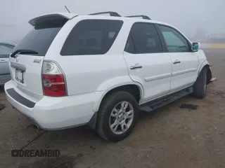 2004 Acura MDX Touring Pkg w/Navigation with VIN 2HNYD18874H545924, listed as a IAAI auction lot 41080740 with 343,574 mi miles. Bid and sale history available at carsss.com. Image 4.