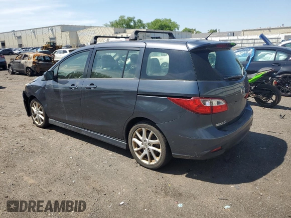2012 Mazda 5 Grand Touring with VIN JM1CW2DLXC0121134, listed as a Copart auction lot 56539825 with 130,962 mi miles and Salvage title. Bid and sale history available at DreamBid. Image 2.