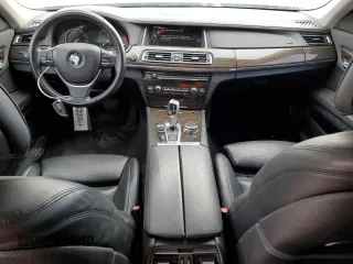 2015 BMW 7 Series 740Li xDrive with VIN WBAYF4C50FGS99289, listed as a Copart auction lot 79809474 with 128,993 mi miles and Salvage Title. Bid and sale history available at carsss.com. Image 8.