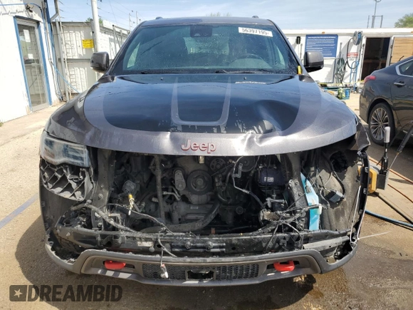 2017 Jeep Grand Cherokee Trailhawk with VIN 1C4RJFLGXHC654112, listed as a Copart auction lot 56397195 with 168,136 mi miles and Salvage title. Bid and sale history available at DreamBid. Image 5.