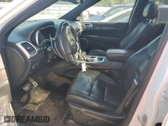 2016 Jeep Grand Cherokee Overland with VIN 1C4RJFCG3GC364485, listed as a Copart auction lot 60727935 with 101,742 mi miles and Salvage title. Bid and sale history available at DreamBid. Image 7.