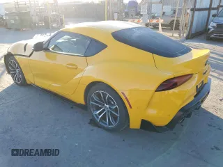 2021 Toyota GR Supra 2.0 with VIN WZ1DB2C02MW043214, listed as a Copart auction lot 82010334 with 56,704 mi miles and Clean Title. Bid and sale history available at carsss.com. Image 2.