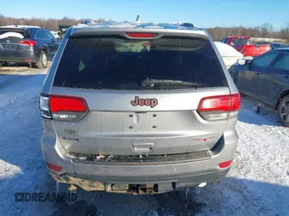 2017 Jeep Grand Cherokee Trailhawk with VIN 1C4RJFLT4HC657682, listed as a IAAI auction lot 41286507 with 123,646 mi miles and . Bid and sale history available at DreamBid. Image 16.