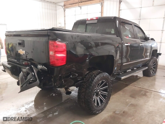 2015 Chevrolet Silverado 1500 High Country with VIN 3GCUKTEJXFG320011, listed as a IAAI auction lot 41366273 with 157,947 mi miles. Bid and sale history available at carsss.com. Image 4.