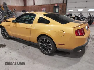 2011 Ford Mustang V6 with VIN 1ZVBP8AM4B5152063, listed as a IAAI auction lot 41556393 with 125,604 mi miles and . Bid and sale history available at carsss.com. Image 3.