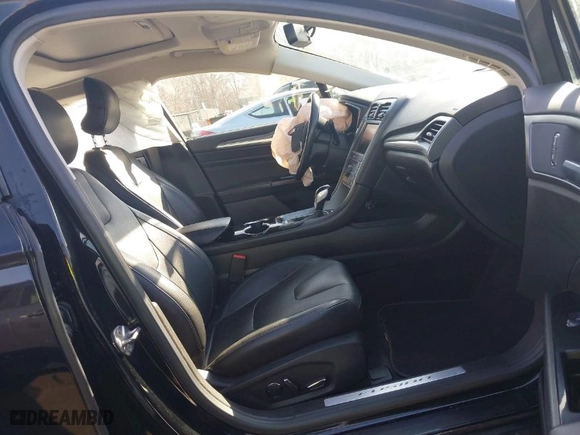 2016 Ford Fusion Energi Titanium with VIN 3FA6P0SU3GR273200, listed as a IAAI auction lot 41769899 with 152,193 mi miles. Bid and sale history available at carsss.com. Image 5.