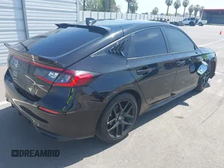 2023 Honda Civic Sport with VIN 19XFL2H84PE001354, listed as a IAAI auction lot 42053691 with 34,127 mi miles and . Bid and sale history available at DreamBid. Image 4.
