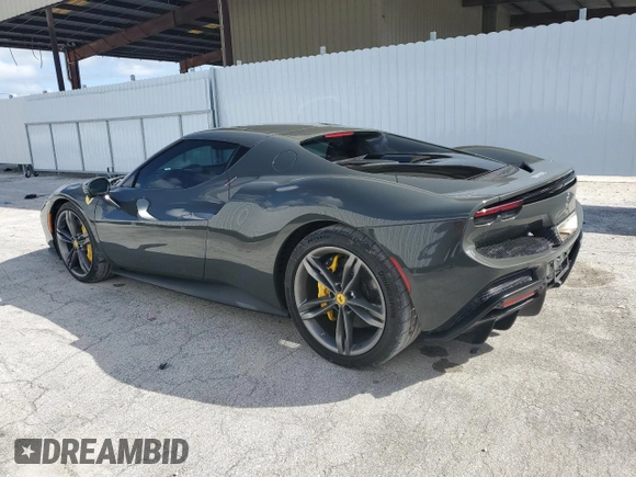 2023 Ferrari 296 GTB z VIN ZFF99SLA3P0294907, wystawiony jako Copart lot #79018584 z przebiegiem 2 504 mil mil oraz Czysty tytuł • Clean title. Historia ofert i sprzedaży dostępna na DreamBid. Obrazek 2.