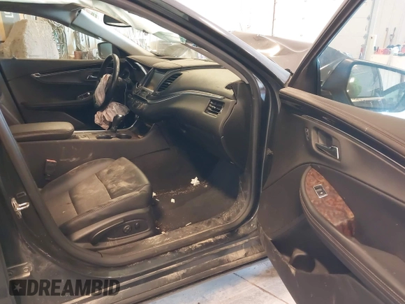 2014 Chevrolet Impala LT z VIN 2G1115SL8E9253725, wystawiony jako IAAI lot #42125365 z przebiegiem 162 486 mil mil oraz . Historia ofert i sprzedaży dostępna na DreamBid. Obrazek 5.
