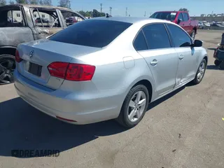 2012 Volkswagen Jetta TDI w/Premium with VIN 3VWLL7AJ8CM314305, listed as a IAAI auction lot 41885355 with 75,669 mi miles and . Bid and sale history available at DreamBid. Image 4.