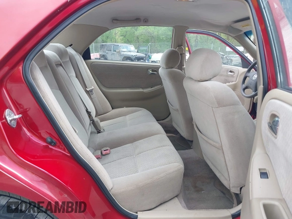 2000 Mazda 626 LX with VIN 1YVGF22C8Y5115891, listed as a IAAI auction lot 42121137 with 186,165 mi miles. Bid and sale history available at carsss.com. Image 8.
