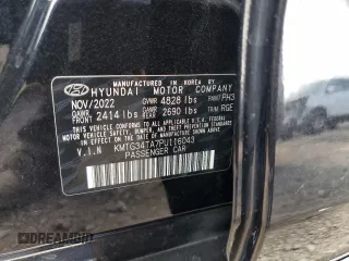 2023 Genesis G70 2.0T with VIN KMTG34TA7PU116043, listed as a Copart auction lot 59585225 with 8,021 mi miles and Salvage title. Bid and sale history available at DreamBid. Image 12.
