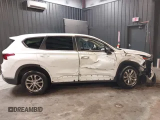 2020 Hyundai Santa Fe SE with VIN 5NMS2CAD8LH163523, listed as a IAAI auction lot 42123756 with 72,992 mi miles and . Bid and sale history available at DreamBid. Image 14.