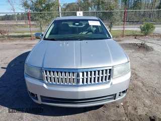 2009 Lincoln MKZ with VIN 3LNHM26T49R603563, listed as a IAAI auction lot 41822110 with 140,504 mi miles and . Bid and sale history available at DreamBid. Image 12.