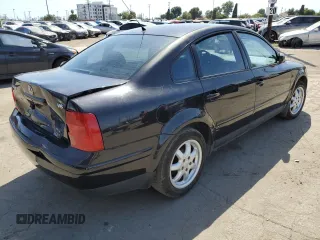 2000 Volkswagen Passat GLS z VIN WVWMD23B0YP307525, wystawiony jako Copart lot #57040775 z przebiegiem 167 440 mil mil oraz Szkoda całkowita • Salvage title. Historia ofert i sprzedaży dostępna na DreamBid. Obrazek 3.
