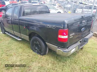 2005 Ford F-150 STX with VIN 1FTRX14W75NA08355, listed as a IAAI auction lot 42634298 with 229,704 mi miles and . Bid and sale history available at DreamBid. Image 3.