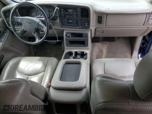2004 GMC Sierra 1500 SLE z VIN 2GTEK19TX41104508, wystawiony jako Copart lot #56981295 z przebiegiem 180 252 mil mil oraz Czysty tytuł • Clean title. Historia ofert i sprzedaży dostępna na DreamBid. Obrazek 8.