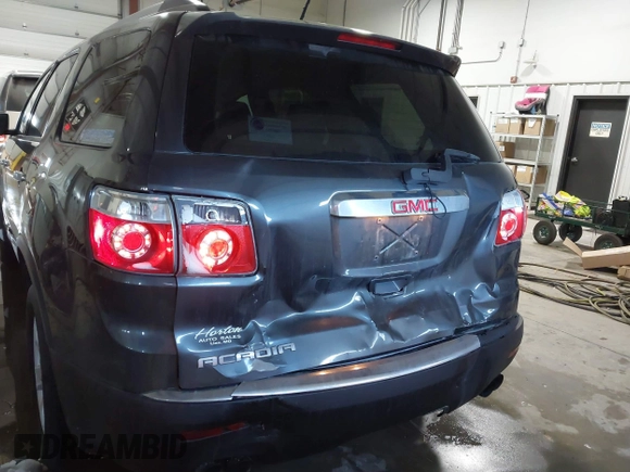 2012 GMC Acadia SL z VIN 1GKKRNEDXCJ420617, wystawiony jako IAAI lot #41608970 z przebiegiem 171 846 mil mil oraz . Historia ofert i sprzedaży dostępna na DreamBid. Obrazek 6.