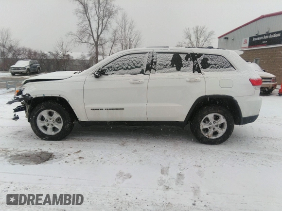 2017 Jeep Grand Cherokee Laredo with VIN 1C4RJEAG9HC854492, listed as a IAAI auction lot 41184619 with 134,839 mi miles. Bid and sale history available at carsss.com. Image 14.