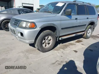 2003 Mitsubishi Montero Sport ES with VIN JA4LS21H13J011931, listed as a IAAI auction lot 41847642 with 113,559 mi miles. Bid and sale history available at carsss.com. Image 2.
