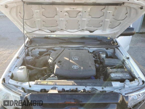 2013 Toyota Tacoma with VIN 5TFUU4EN3DX075550, listed as a Copart auction lot 83869904 with 128,738 mi miles and Salvage Title. Bid and sale history available at DreamBid. Image 12.