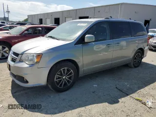 2018 Dodge Grand Caravan SXT z VIN 2C4RDGCG8JR265611, wystawiony jako Copart lot #58957515 z przebiegiem 330 609 mil mil oraz Czysty tytuł • Clean title. Historia ofert i sprzedaży dostępna na DreamBid. Obrazek 1.
