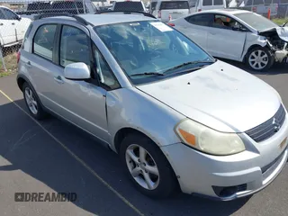 2009 Suzuki SX4 Man FWD with VIN JS2YA413396201567, listed as a IAAI auction lot 41567377 with 110,894 mi miles. Bid and sale history available at carsss.com. Image 6.