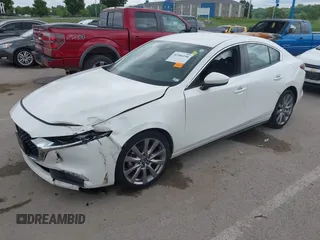 2020 Mazda 3 Select with VIN JM1BPACL1L1171032, listed as a IAAI auction lot 42366156 with 94,055 mi miles and . Bid and sale history available at DreamBid. Image 2.