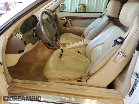 1999 Mercedes-Benz SL-Class with VIN WDBFA68F2XF179134, listed as a Copart auction lot 67335014 with 68,406 mi miles and Clean Title. Bid and sale history available at carsss.com. Image 7.