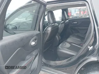 2019 Jeep Cherokee Trailhawk Elite with VIN 1C4PJMBX6KD313675, listed as a IAAI auction lot 41448924 with 51,639 mi miles. Bid and sale history available at carsss.com. Image 8.