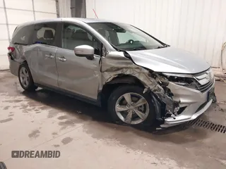 2019 Honda Odyssey EX-L z VIN 5FNRL6H77KB123527, wystawiony jako IAAI lot #41974037 z przebiegiem 95 107 mil mil oraz . Historia ofert i sprzedaży dostępna na DreamBid. Obrazek 1.