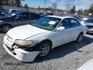 2000 Honda Accord EX with VIN 1HGCG1656YA060793, listed as a IAAI auction lot 41884449 with 232,519 mi miles and . Bid and sale history available at DreamBid. Image 14.