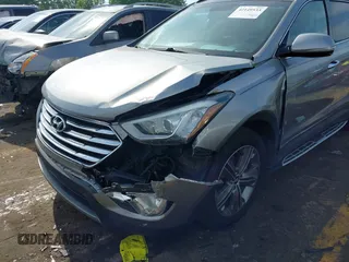 2013 Hyundai Santa Fe Limited z VIN KM8SR4HF1DU005619, wystawiony jako IAAI lot #42149533 z przebiegiem 135 268 mil mil oraz . Historia ofert i sprzedaży dostępna na DreamBid. Obrazek 6.