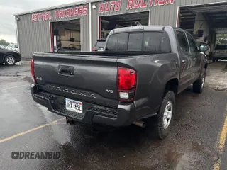 2021 Toyota Tacoma SR z VIN 5TFCZ5AN2MX279975, wystawiony jako IAAI lot #42477503 z przebiegiem 50 690 mil mil oraz . Historia ofert i sprzedaży dostępna na DreamBid. Obrazek 14.