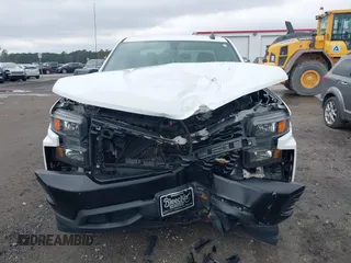 2020 Chevrolet Silverado 1500 with VIN 1GCRWAEK3LZ210873, listed as a IAAI auction lot 41533740 with 142,542 mi miles and . Bid and sale history available at DreamBid. Image 12.