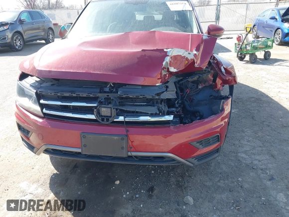 2019 Volkswagen Tiguan SE with VIN 3VV3B7AX3KM130075, listed as a IAAI auction lot 41807584 with 57,308 mi miles and . Bid and sale history available at DreamBid. Image 6.