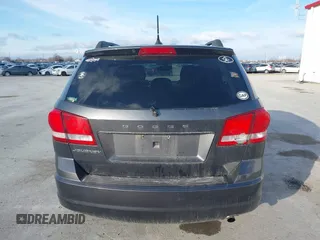 2014 Dodge Journey SE with VIN 3C4PDCAB0ET283756, listed as a IAAI auction lot 41490472 with 122,695 mi miles. Bid and sale history available at carsss.com. Image 17.