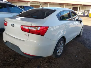 2016 Kia Rio LX with VIN KNADM4A38G6564814, listed as a IAAI auction lot 41789215 with 122,872 mi miles. Bid and sale history available at carsss.com. Image 4.