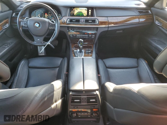 2015 BMW 7 Series 750i xDrive with VIN WBAYB6C57FD965993, listed as a Copart auction lot 83871924 with 76,720 mi miles and Salvage Title. Bid and sale history available at carsss.com. Image 8.