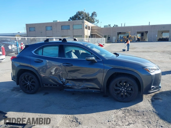 2022 Lexus UX with VIN JTHX3JBH6N2056436, listed as a IAAI auction lot 41856541 with 12,815 mi miles. Bid and sale history available at carsss.com. Image 13.