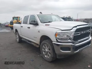 2021 Ram 2500 Tradesman with VIN 3C6UR5CL1MG695849, listed as a IAAI auction lot 40977178 with 104,097 mi miles. Bid and sale history available at carsss.com. Image 1.