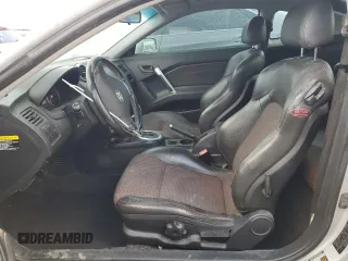 2006 Hyundai Tiburon GT z VIN KMHHN65F06U203701, wystawiony jako Copart lot #52374135 z przebiegiem 90 796 mil mil oraz Szkody całkowita. Historia ofert i sprzedaży dostępna na DreamBid. Obrazek 7.