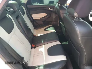 2014 Ford Focus Titanium with VIN 1FADP3J26EL132223, listed as a Copart auction lot 71490004 with 131,233 mi miles and Salvage Title. Bid and sale history available at DreamBid. Image 10.