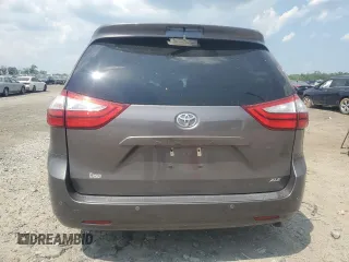 2015 Toyota Sienna XLE with VIN 5TDYK3DC6FS576670, listed as a Copart auction lot 62612345 with 106,475 mi miles and Salvage title. Bid and sale history available at DreamBid. Image 6.