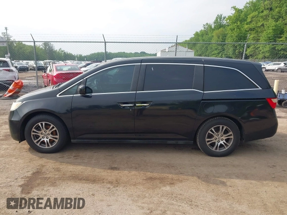 2011 Honda Odyssey EX-L with VIN 5FNRL5H68BB071178, listed as a IAAI auction lot 42286324 with 213,847 mi miles and . Bid and sale history available at DreamBid. Image 14.