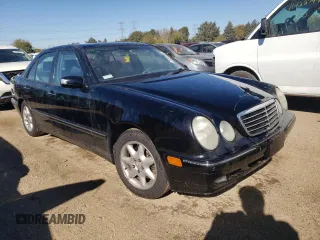 2001 Mercedes-Benz E-Class with VIN WDBJF65J01B325792, listed as a Copart auction lot 76328704 with 101,886 mi miles and Salvage Title. Bid and sale history available at carsss.com. Image 4.