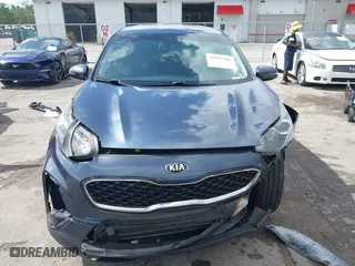 2020 Kia Sportage LX with VIN KNDPM3AC3L7713581, listed as a IAAI auction lot 40255286 with 90,221 mi miles. Bid and sale history available at carsss.com. Image 11.