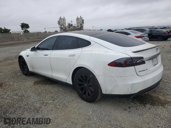 2014 Tesla Model S 60 с VIN 5YJSA1H19EFP52457, выставлен на аукционе Copart как лот 59589905 с пробегом 167 662 миль миль и Списание • Salvage title. История ставок и продаж доступна на DreamBid. Изображение 2.