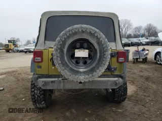 2007 Jeep Wrangler Unlimited Rubicon с VIN 1J4GA691X7L145737, выставлен на аукционе Copart как лот 86277914 с пробегом 285 624 миль миль и Списание • Salvage title. История ставок и продаж доступна на DreamBid. Изображение 6.
